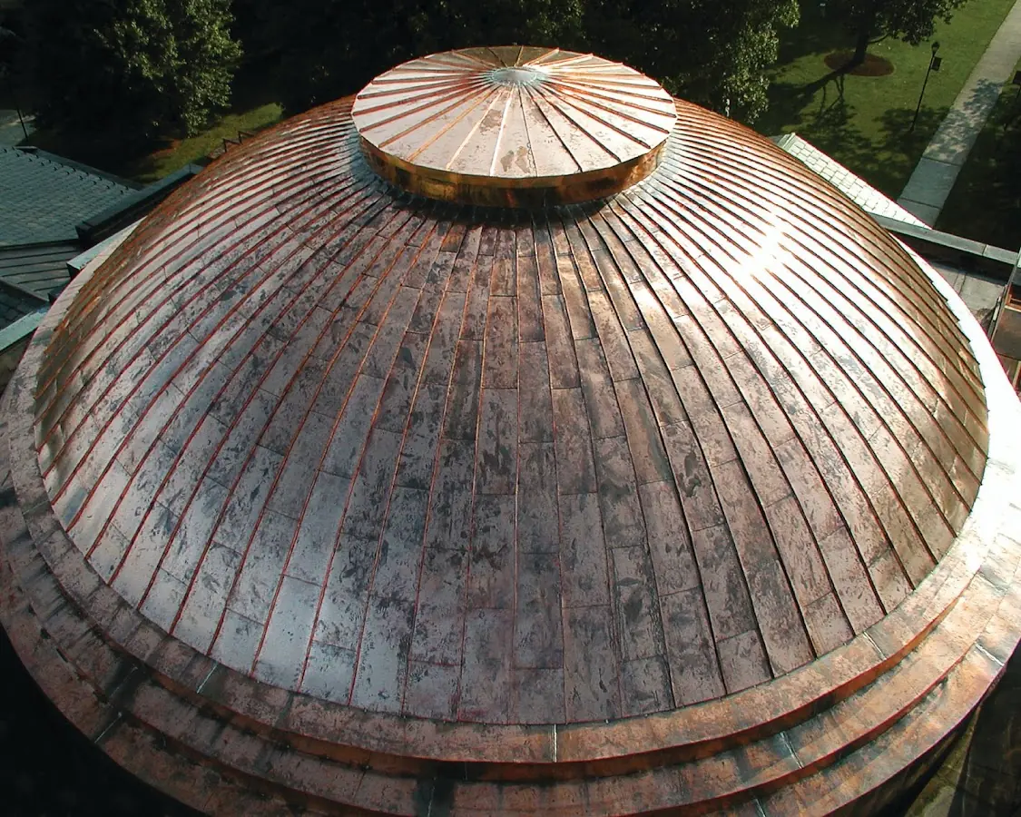 Craftsman Roofing crew installing a new roof in Greenfield Village
